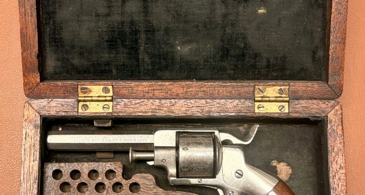 Allen & Wheelock 22RF Side-Hammer Revolver - Intermediate Fifth Model - Left side view - In wooden case with cartridges